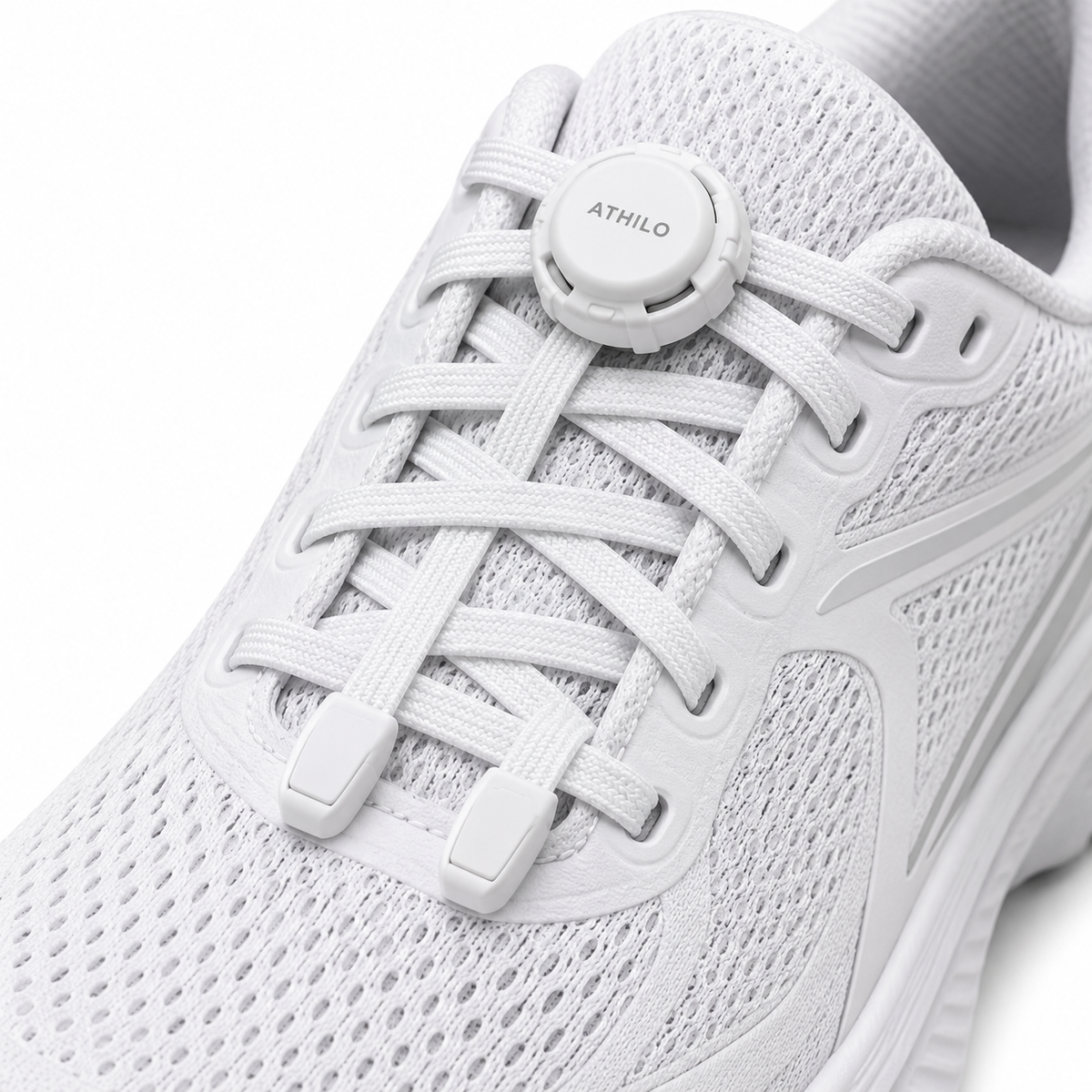 Détail système de verrouillage ATHILO LOCK blanc sur chaussure running